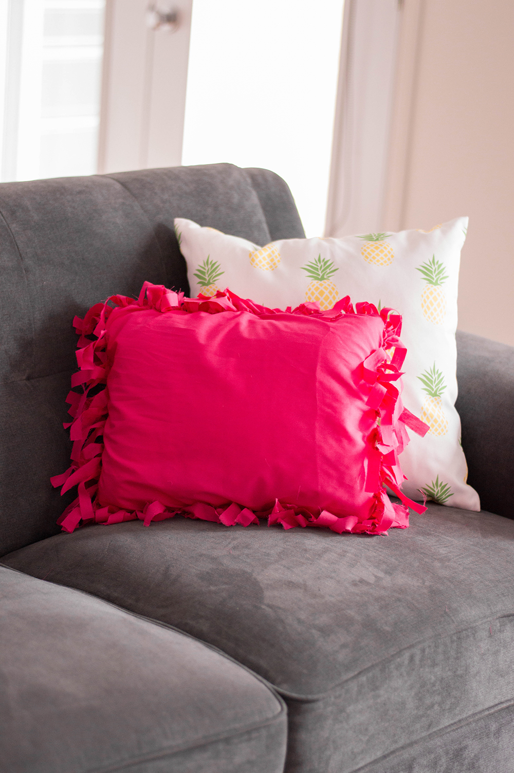 Adding a touch of colour to my otherwise neutral living room with my DIY No-Sew Pillows.