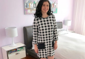 Black and white gingham jersey dress with black patch pockets