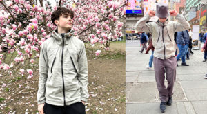 Grey windbreaker and baggy pants against blooming magnolia and on Times Square