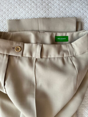 Top and bottom of greige trousers