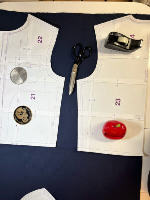 Cutting of pattern pieces for navy corduroy jacket
